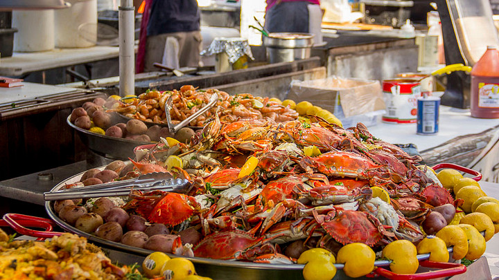 Steamed seafood, crab, potatoes, lemons 