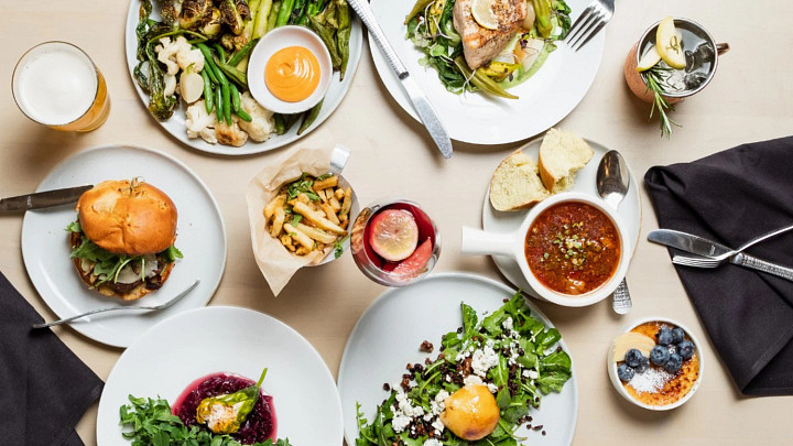 Table filled with farm-to-table dishes from Fork and Plough