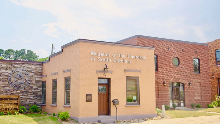 Exterior of white brick Museum of the Cherokee 