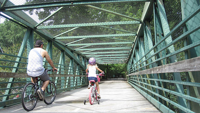 adult and child on bicycles 