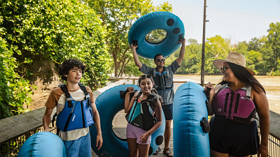 family ready to go river tubing