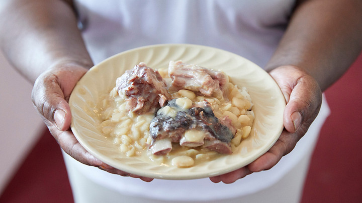 Angie Bellinger holding a plate of food
